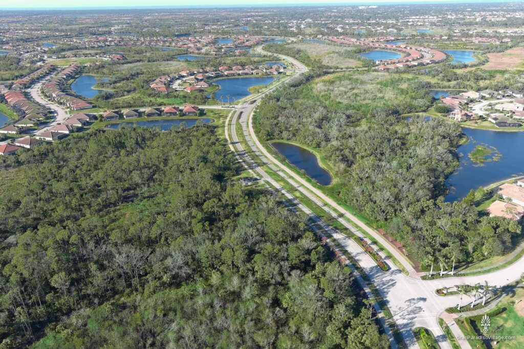 Wellen Park aerial of Gran Paradiso's tile-roofed homes, preserves and lakes