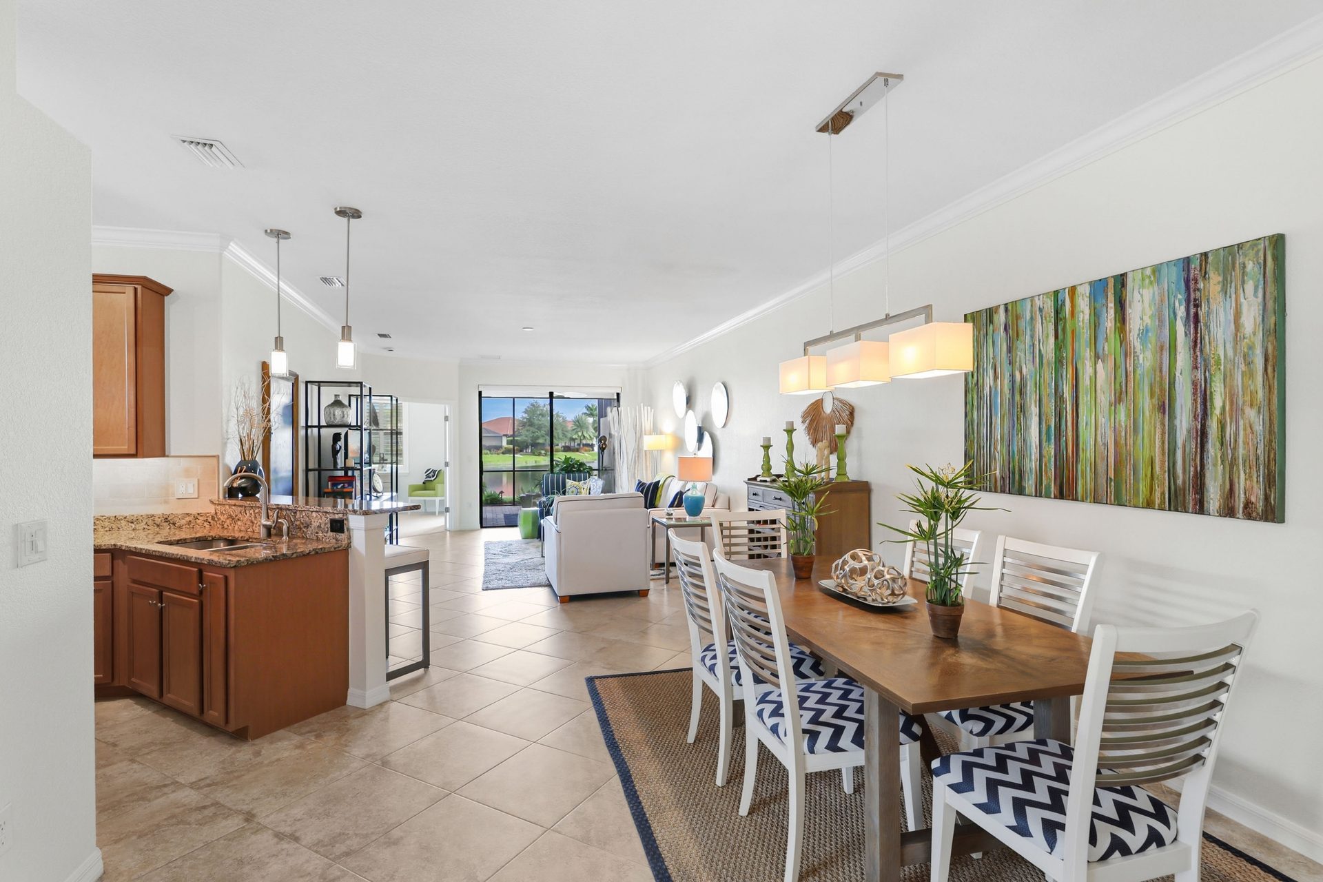 Kitchen, dining and living areas at 20297 Tesoro Dr, open through to the lanai