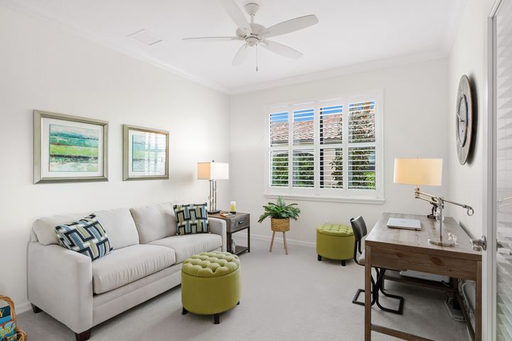 Den with plantation shutters