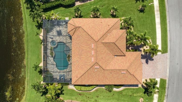 Top-down aerial of the oversized homesite and pool