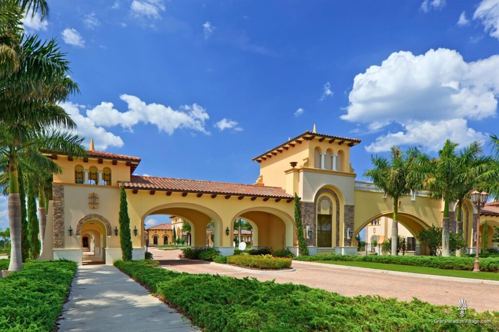 Gran Paradiso gatehouse and palm-lined entrance