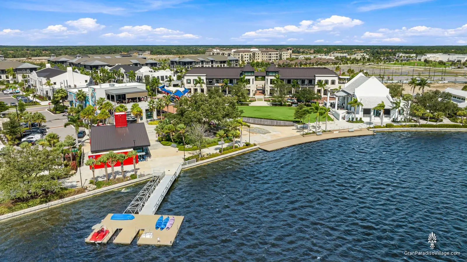 Aerial view of the Grand Lake and Downtown Wellen with neighborhoods beyond, Wellen Park, Venice FL